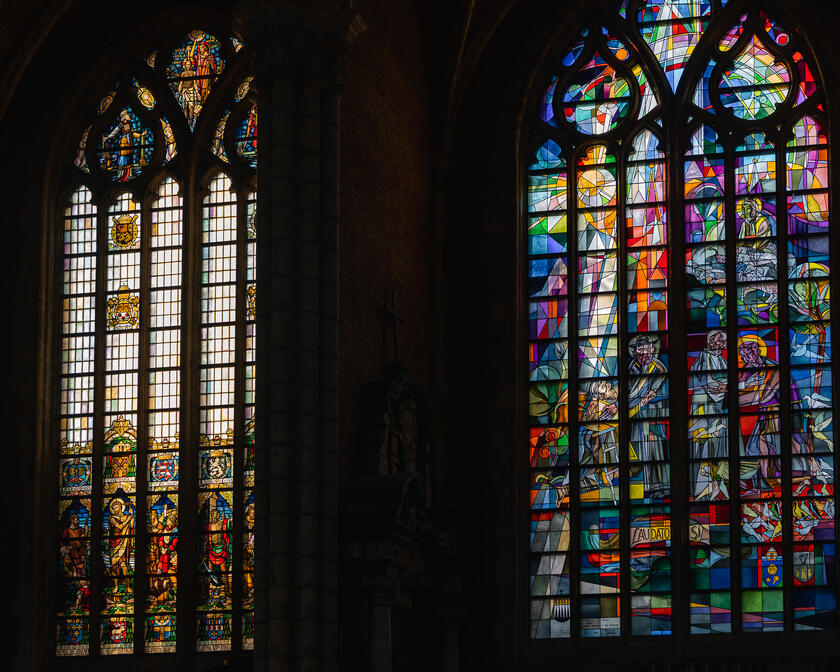 Colorful stained glass windows of the St Bavo's Cathedral in Ghent