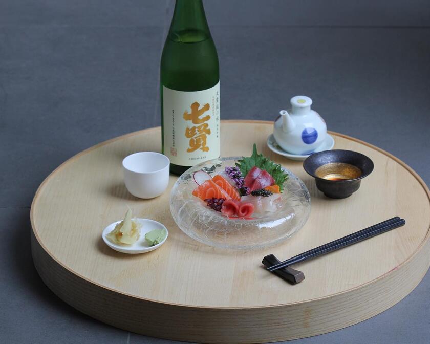 Plate with Japanese dish and sake
