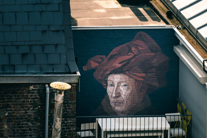 Street Art werk gebaseerd op "Man met de rode tulband" van Jan Van Eyck. 