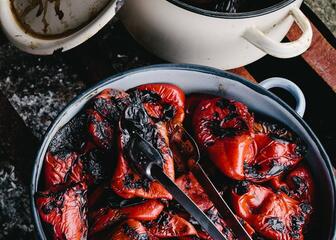 2 cooking pots with grilled peppers