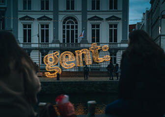 people looking at a light construction of Ghent