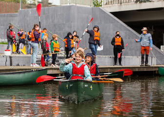 Children go out in a canoe