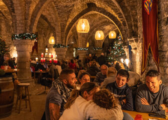 People at a table in a winter bar
