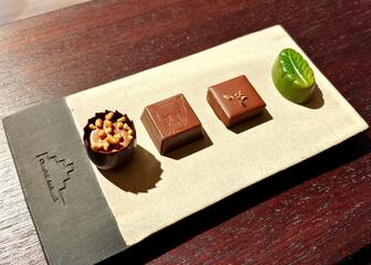 Plate with different chocolates in various shapes 