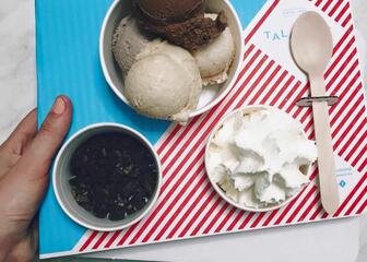 Tray with a pot of ice cream and toppings