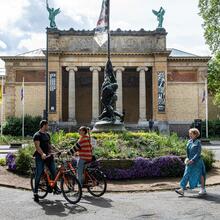 Cyclists and walkers in front of the Museum of Fine Arts